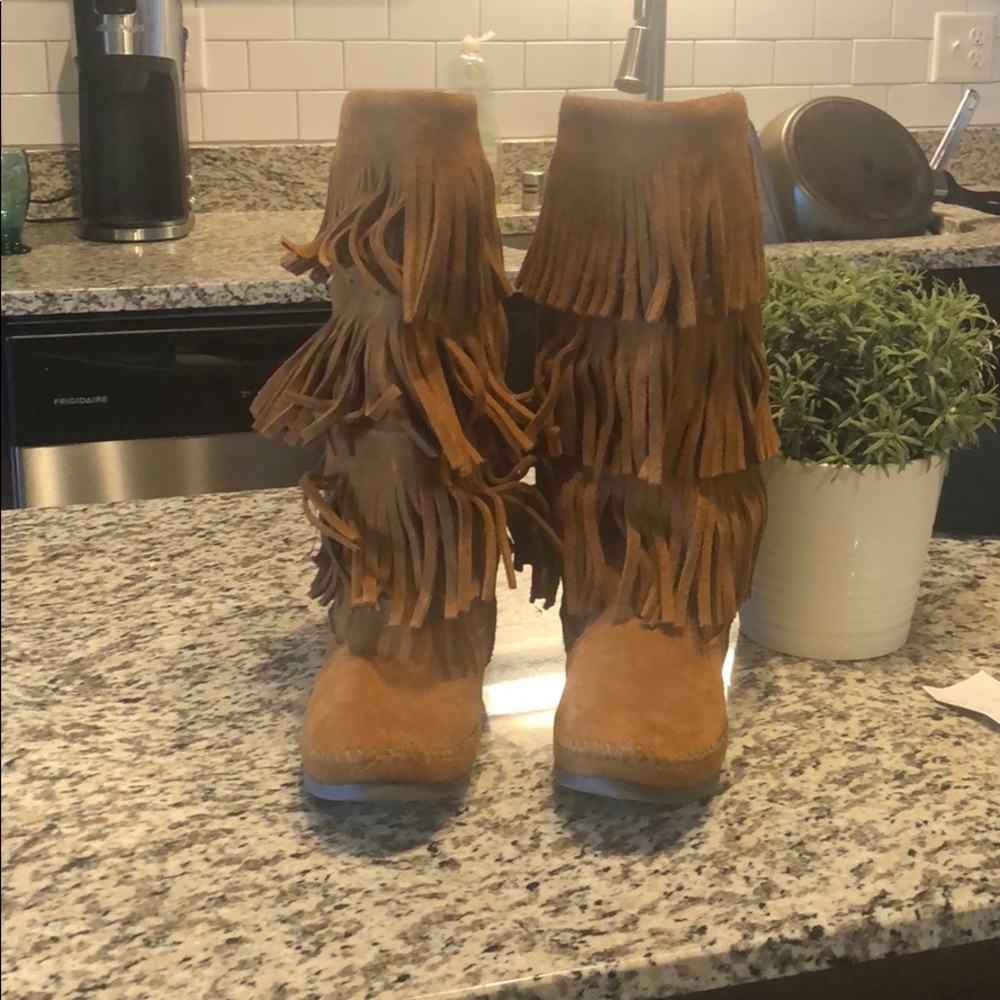 Minnetonka layer fringe women boots.
